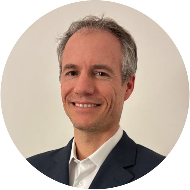 Professional real estate agent portrait in elegant Parisian square, showcasing luxury property expertise and trustworthy service for premium rental properties.